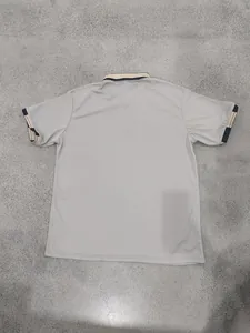 Back view of a grey quick-dry athletic polo shirt with striped collar and cuffs detail