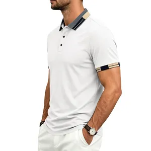 Detail shot of men's white quick-dry golf polo shirt with contrast collar and cuffs.