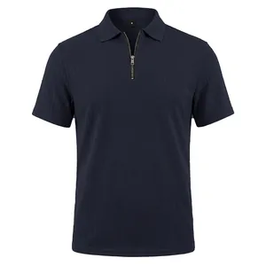 Detailed view of navy blue men's jacquard Polo shirt with zipper collar and textured fabric