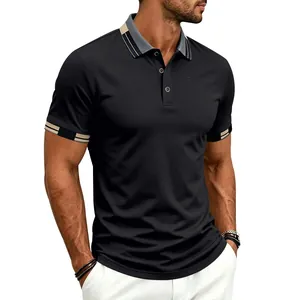 Detailed view of men's quick-dry black polo shirt with contrast collar and cuffs
