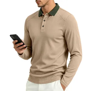 Detail view of men's long sleeve polo shirt featuring green rib collar and texture.
