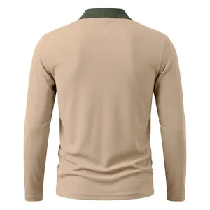 Rear view of a textured khaki long sleeve polo shirt featuring a green ribbed collar