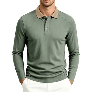 Macro view of men's long sleeve Polo shirt showing sage green ribbed fabric texture.