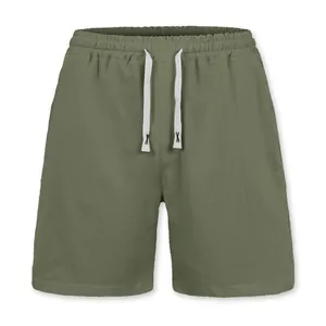 Olive green linen men's shorts with drawstring elastic waist and solid color