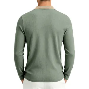 Back view of a men's textured sage green polo shirt with contrast collar