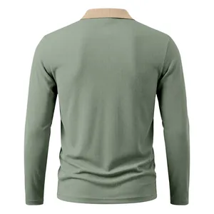 Rear view showing textured fabric and khaki ribbed collar of green men's Polo shirt