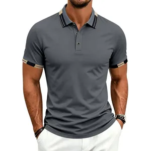 Macro view of grey quick-dry sports polo shirt featuring striped collar and cuff details