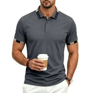 Close-up of men's grey quick-dry polo shirt with contrast striped collar and cuffs.