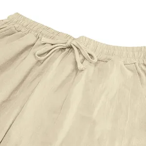 Detail shot of drawstring waistband on men's breathable linen casual pants