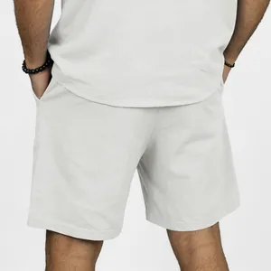 Detailed back view of men's casual linen shorts in light grey featuring a relaxed fit