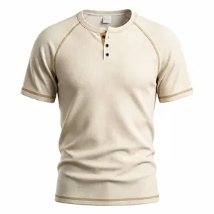 Close-up of cream waffle knit Henley shirt with raglan sleeves and contrast stitching