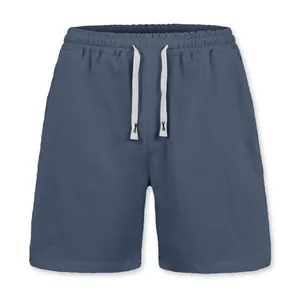 Detail view of men's casual linen shorts with adjustable drawstring and elastic waist.