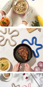 Detailed view of flower-shaped silicone trivets in kitchen and dining table settings