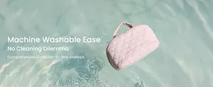 Detailed shot of pink quilted cosmetic bag floating on water, showing water-resistant fabric.