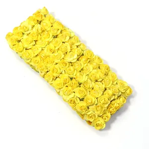 Yellow artificial paper rose flowers mat for DIY wedding party wall decoration crafts.