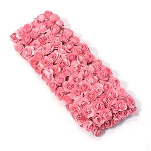 Pink paper rose flowers detail, handmade DIY craft materials for wedding decoration and party walls.