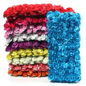 Artificial paper rose flowers, colorful DIY handmade garland and party decoration material.