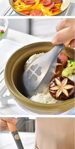 Close-up of translucent gray silicone rice spoon scooping rice from a ceramic pot