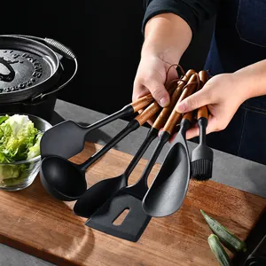 7-piece silicone kitchen utensil set with heat-resistant acacia wood handles for cooking