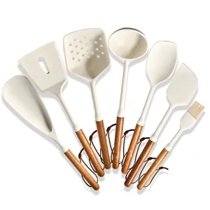 Professional 7-piece cream silicone kitchen utensil set with heat-resistant acacia wood handles