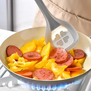 Professional grey silicone cooking spatula with heart clover cutout for non-stick pans
