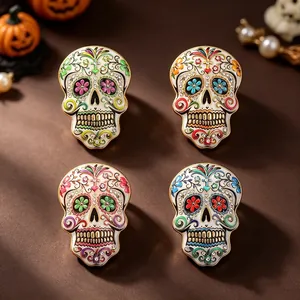 Mexican Day of the Dead sugar skull brooches with colorful floral enamel and rhinestones