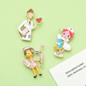 Close-up of colorful cartoon doctor and nurse enamel brooches on green background