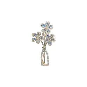 Detailed view of creative flower vase brooch with iridescent crystal petals