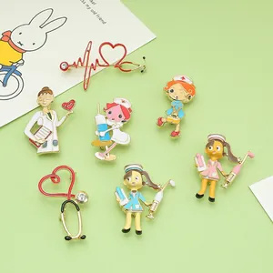 Detail view of colorful enamel medical brooches featuring nurse and doctor characters
