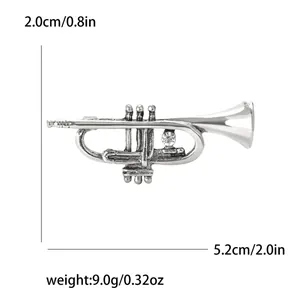 Detailed view of vintage silver trumpet brooch with dimensions 5.2cm and weight 9.0g