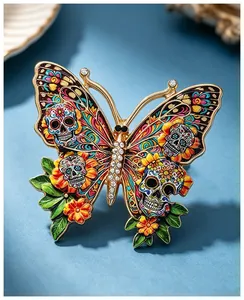 Detailed view of colorful sugar skull butterfly brooch with enamel finish and crystals