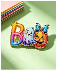 Close-up detail of a vibrant Halloween ghost letter B and pumpkin alloy brooch pin