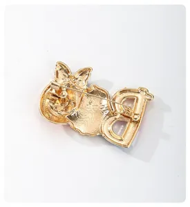 Back view of Halloween ghost brooch with letter B, showing sturdy alloy pin clasp