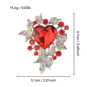 Detail of a red heart-shaped rhinestone brooch showing dimensions and weight info.