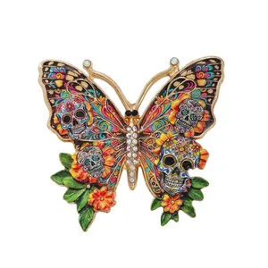 Vibrant butterfly brooch with sugar skull patterns for Halloween and Day of the Dead