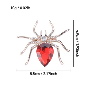 Detail showing dimensions: spider brooch 5.5cm x 4.9cm, weight 10g, Halloween style.