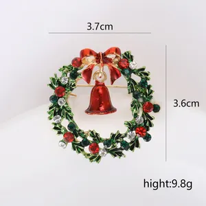 Afmetingen en detailweergave van de kerstkransspeld met rode bel en kleurrijke strassteentjes