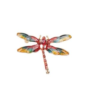 Vintage colorful enamel dragonfly brooch with red crystal accents for suits and shawls