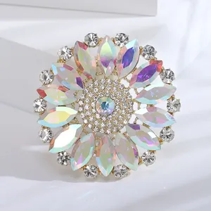 Close-up view of vintage round floral brooch with iridescent AB glass rhinestones