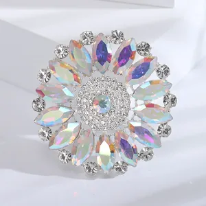 Detailed macro shot of vintage AB color rhinestone flower brooch with iridescent stones