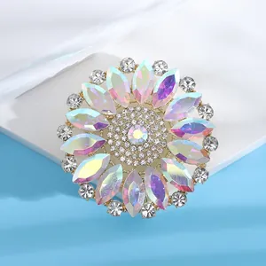 Macro detail view of large round flower brooch with iridescent AB colorful rhinestones