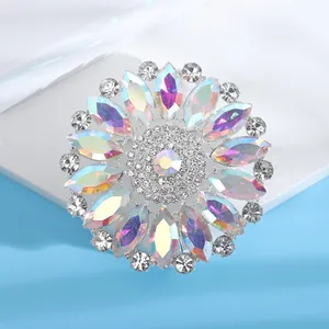 Detailed view of a vintage round AB colorful rhinestone flower brooch with silver finish.