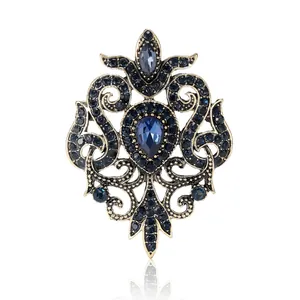 Vintage style Baroque hollow alloy brooch with elegant navy blue glass rhinestones