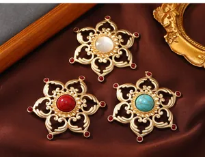 Detail view of vintage hollow lotus brooches with colorful faux stone centers