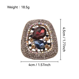 Detailed view of oversized vintage rhinestone brooch with 18.5g weight and sizes