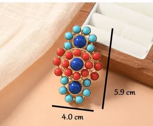 Detailed size view of ethnic lotus brooch with red and blue faux turquoise beads