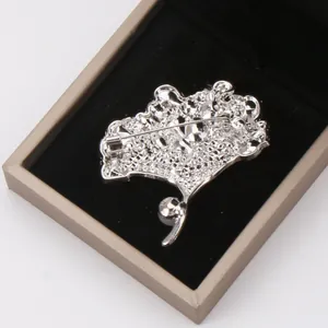 Detailed back view of silver ginkgo leaf brooch showing the pin clasp mechanism.