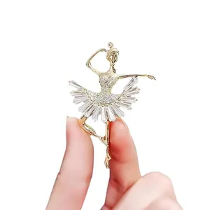 Elegant gold-tone ballerina dancer brooch with sparkling crystals for suits and coats accessory
