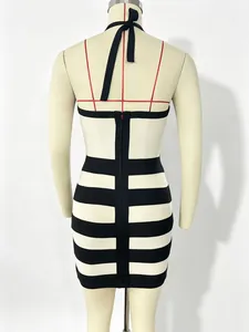 Back view of a sexy black and white striped halter bodycon bandage dress