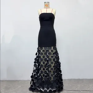 Elegant black strapless maxi dress with 3D floral appliqués on sheer mesh skirt